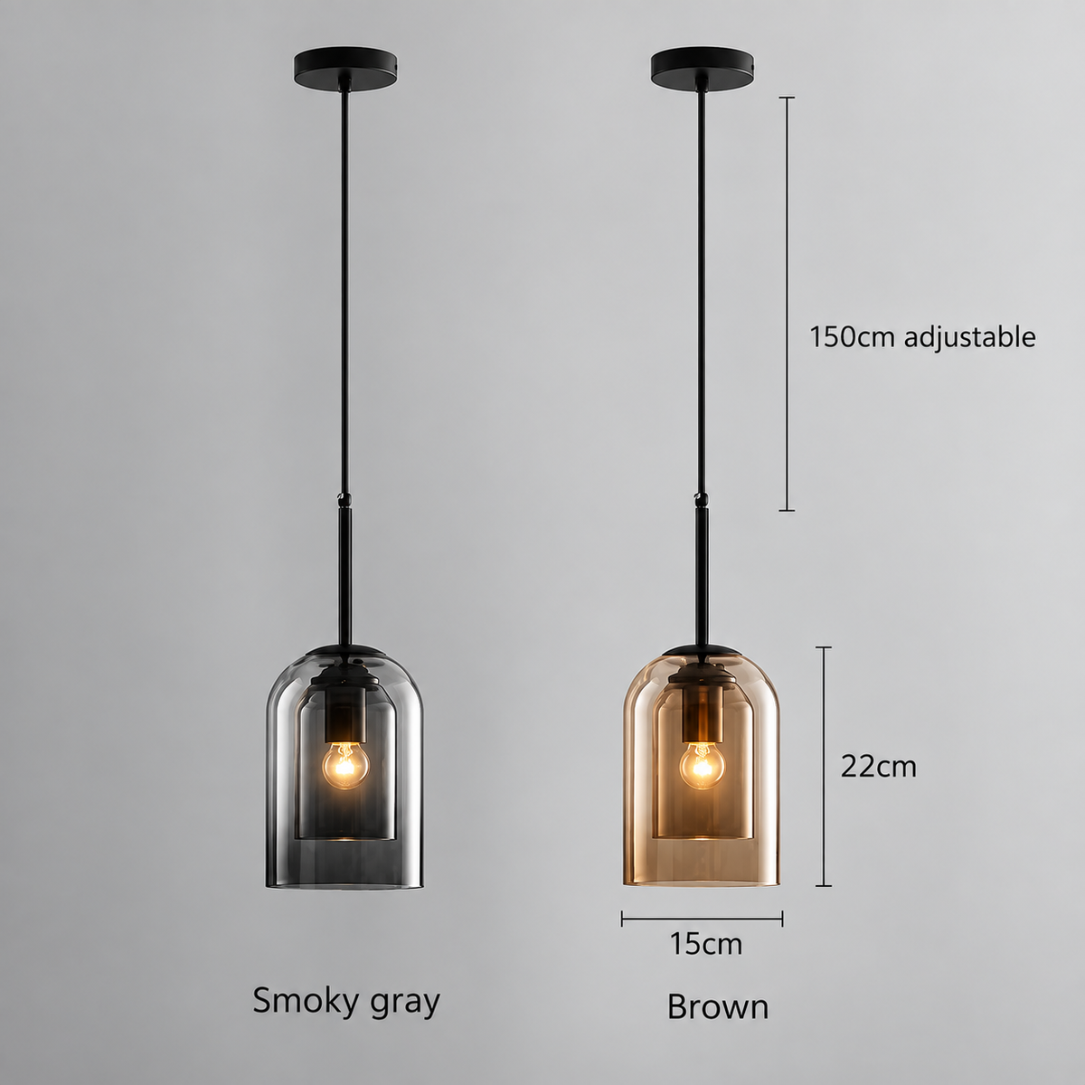Two pendant light fixtures shown side by side on a light gray background, with dimension labels and text indicating adjustable 150cm height, 22cm glass shade depth, and 15cm width. The left fixture is labeled 'Smoky gray' and the right 'Brown'.