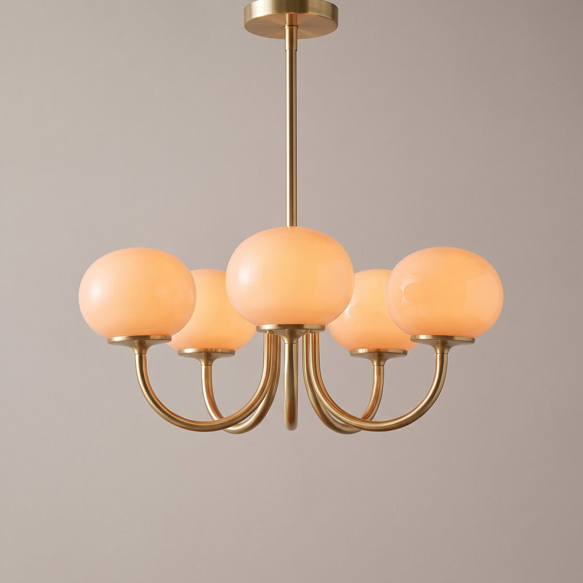 Light Orange, 5 Domes option: Bauhaus glass chandelier with five light orange glass domes on brushed brass arms
