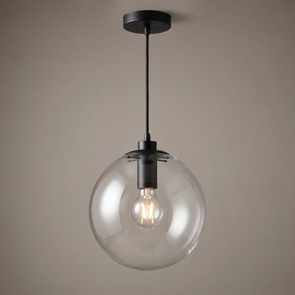 Black finish option: clear glass globe pendant light with a matt black collar, cord and ceiling canopy