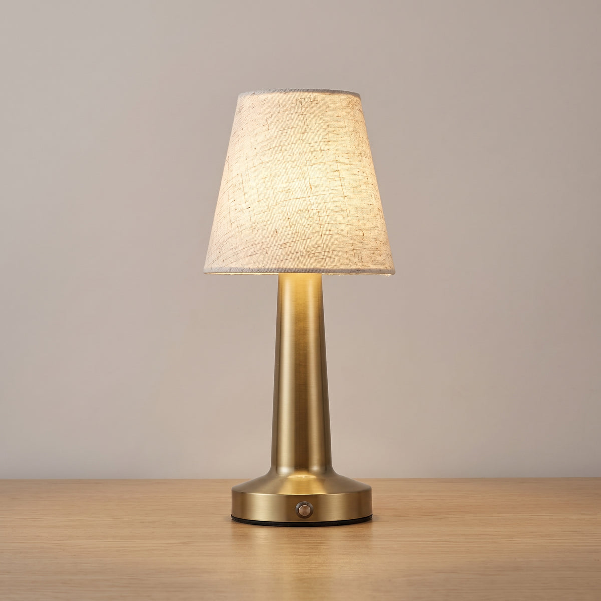 Brushed Brass finish option: cordless linen table lamp with a brushed brass column and base