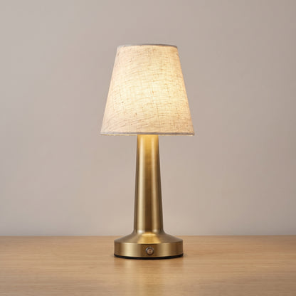 Brushed Brass finish option: cordless linen table lamp with a brushed brass column and base