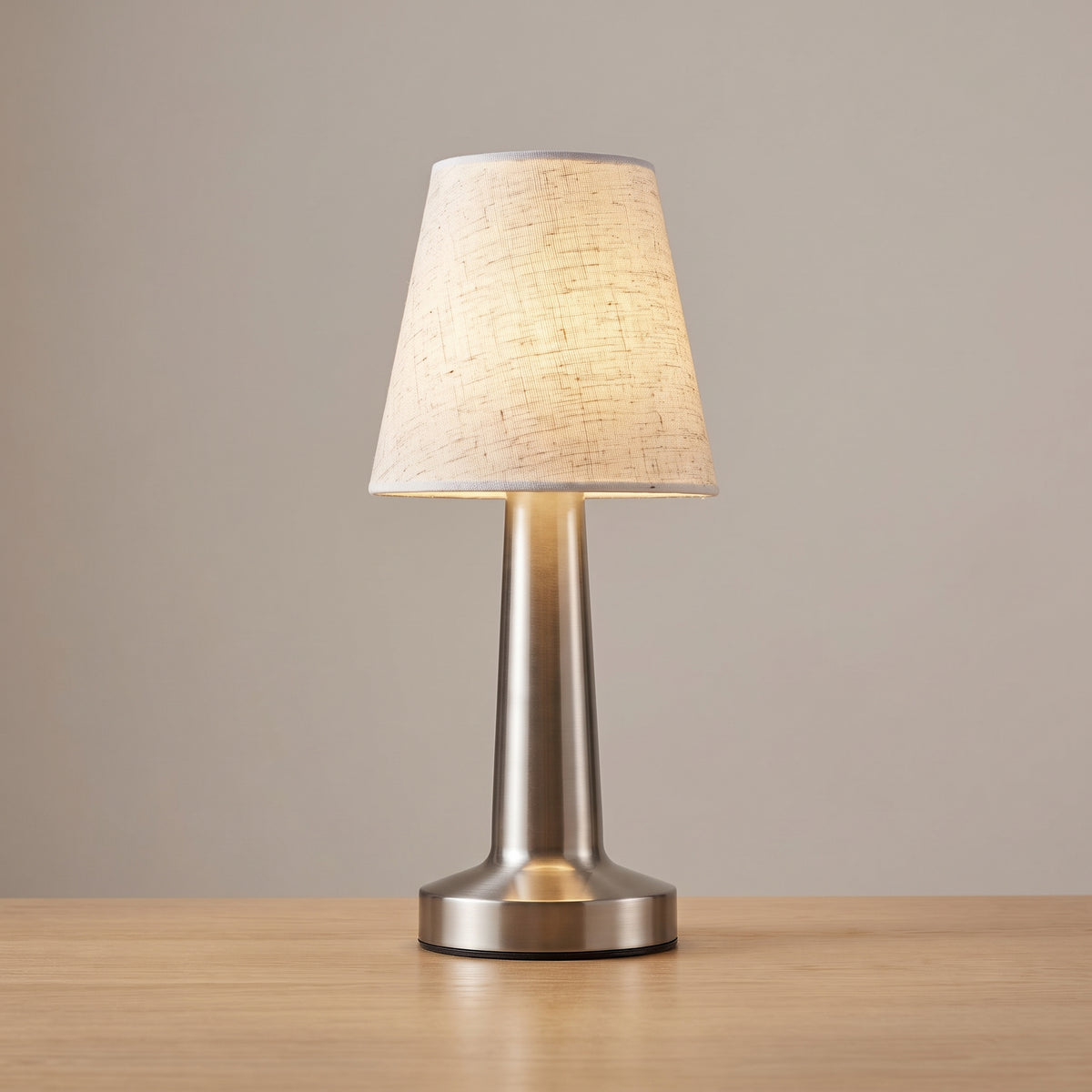 Brushed Silver finish option: cordless linen table lamp with a brushed pewter column and base