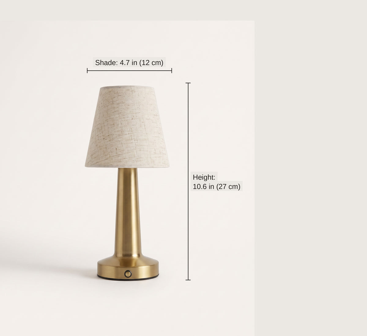 Dimension diagram of the cordless linen table lamp: 10.6 inches tall with a 4.7 inch shade
