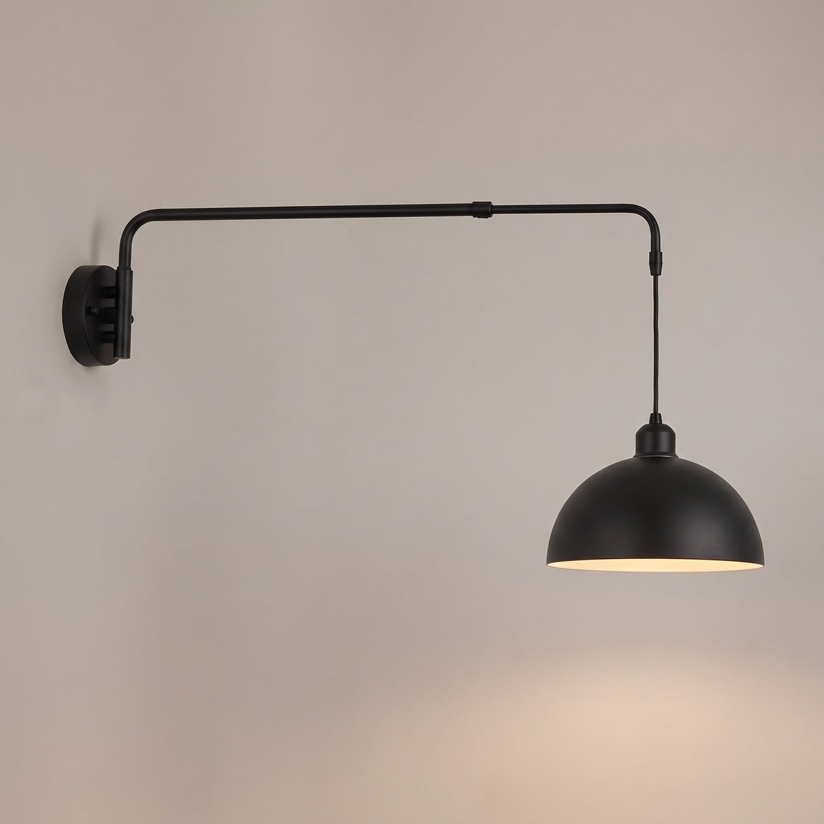Dome shade option: swing arm wall light with a 10 inch curved matt black dome shade