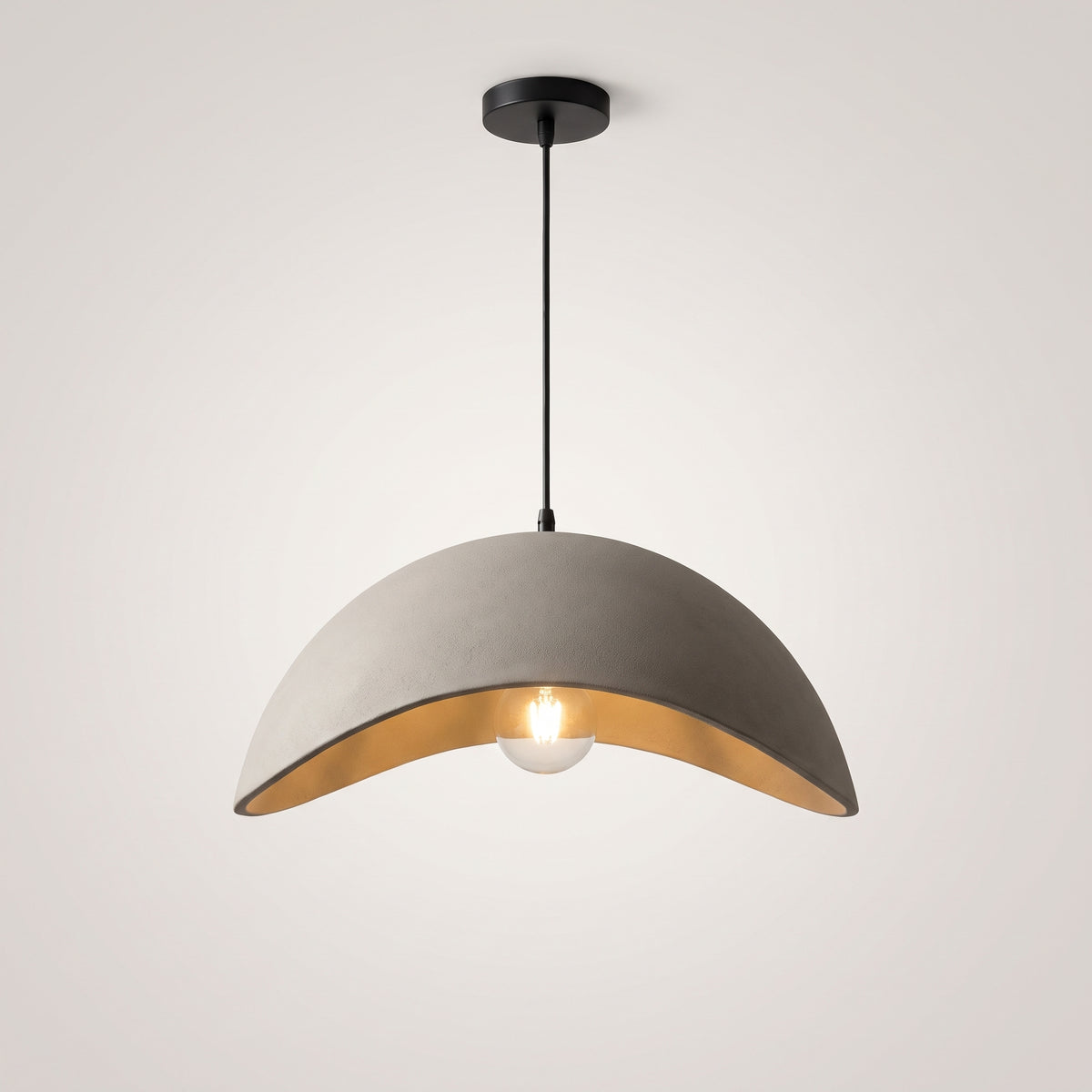 Cement grey Shallow Wave wabi-sabi pendant shade seen from the side