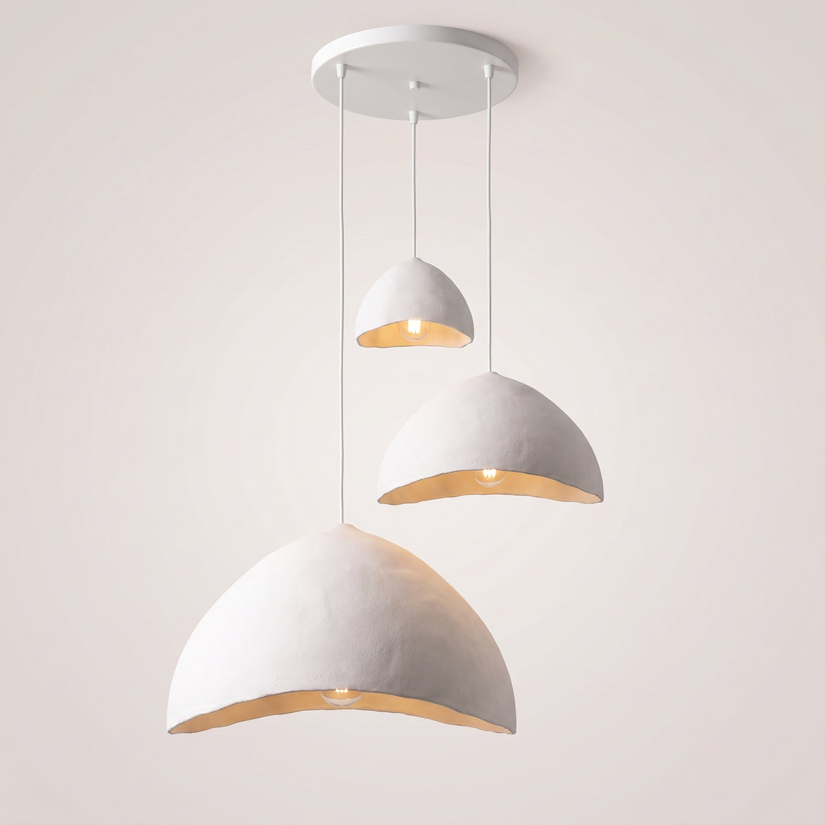 Three-light Deep Dome version with three white shades on a round ceiling plate