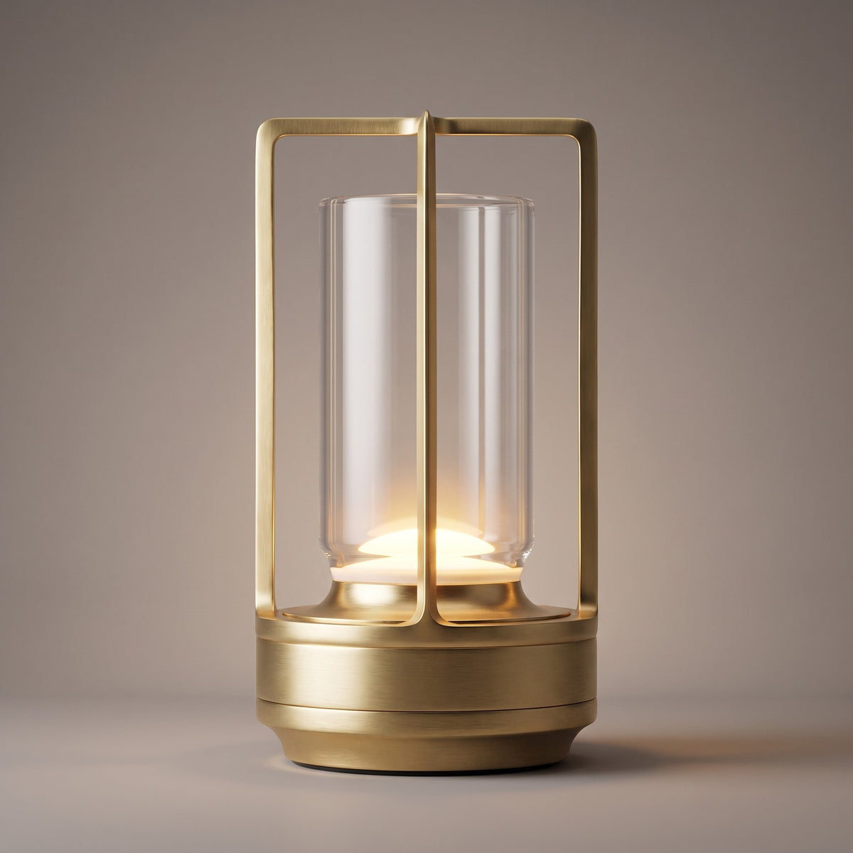 Close up of the gold lantern lamp frame, clear shade and warm LED glow