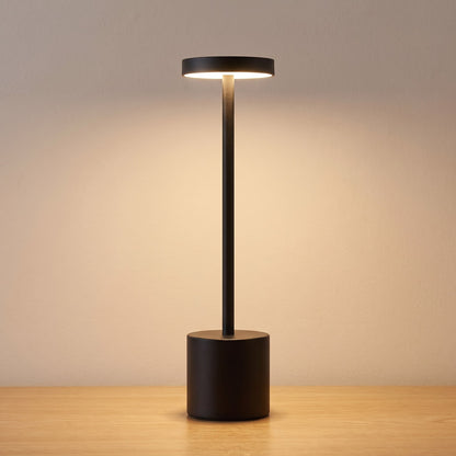 Black finish option: matte black slim cordless table lamp switched on