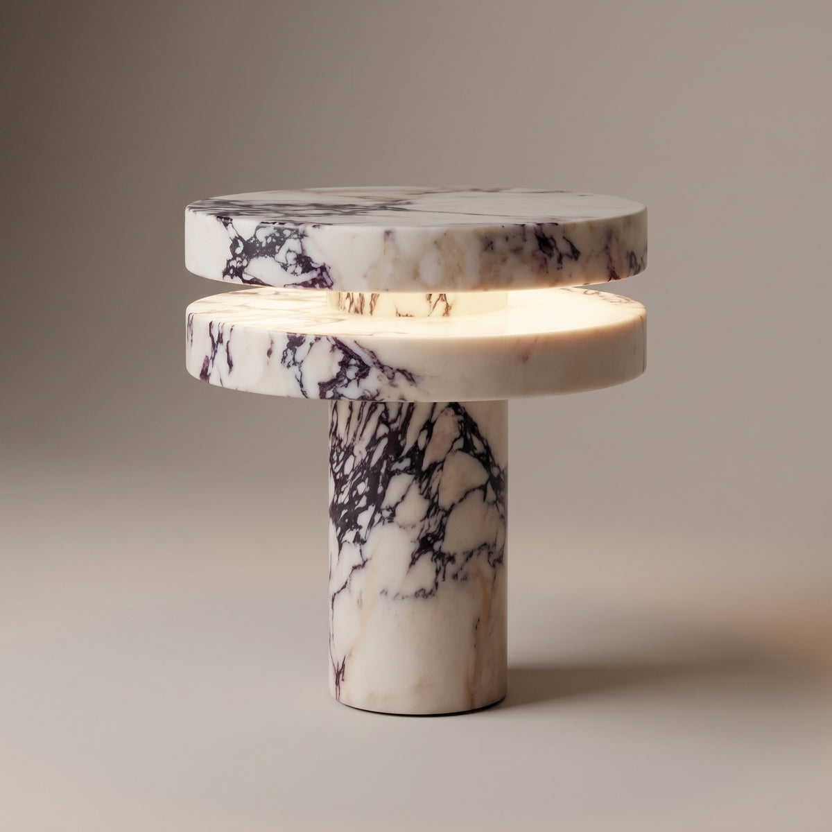 Close up of the purple veined marble discs and the warm LED light between them